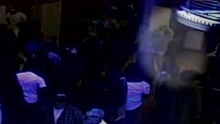 CCTV footage: Shocking moment woman chokes nightclub bouncer