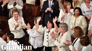 Trump surprised by response from women in white during State of the Union address