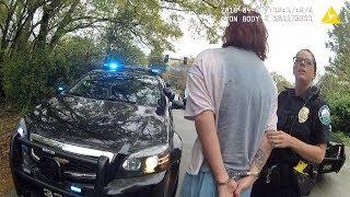 Bodycam video shows woman arrested on the flip of a coin