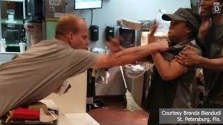 RAW: Man grabs fast-food clerk in fight over straw