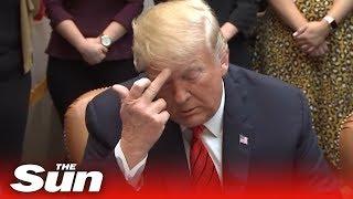Did President Trump flip off two accomplished astronauts?